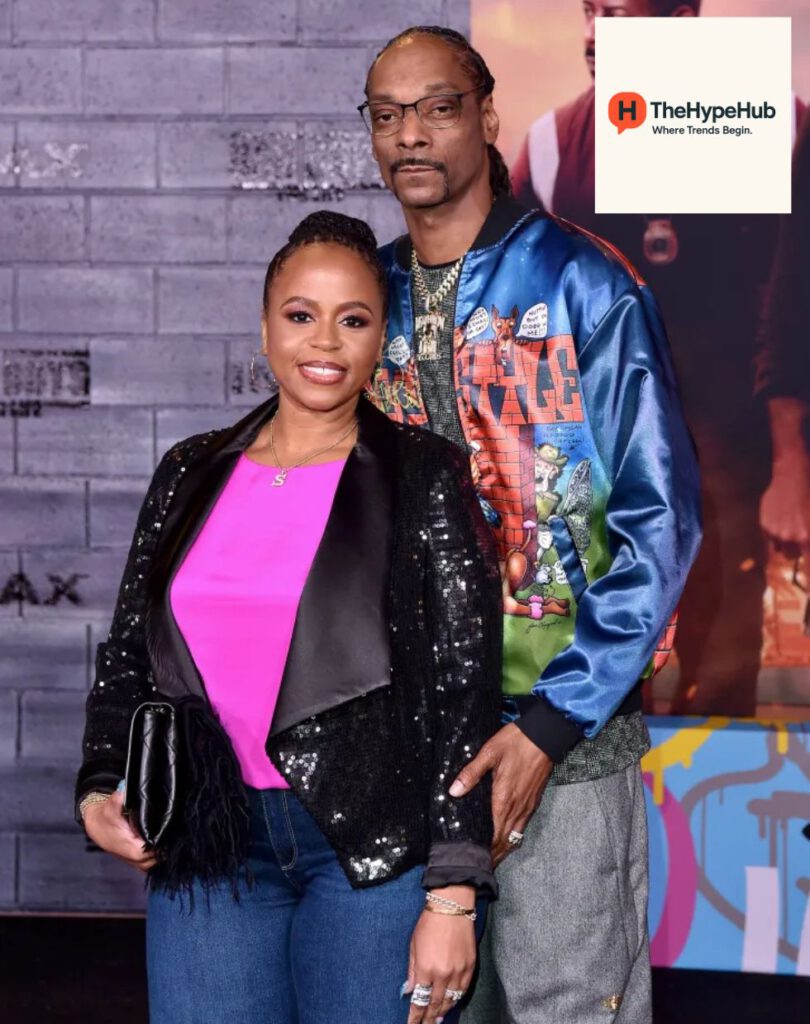 Snoop Dogg with his wife Shante Broadus at a red carpet event